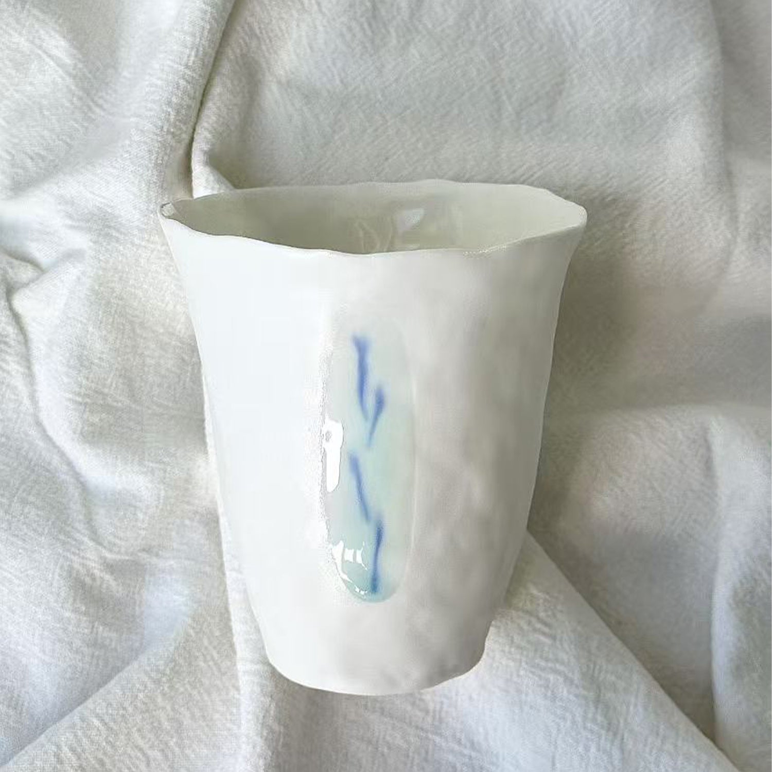 Jiayu · Flowing Eternity · Hand-Pinched White Porcelain Cup