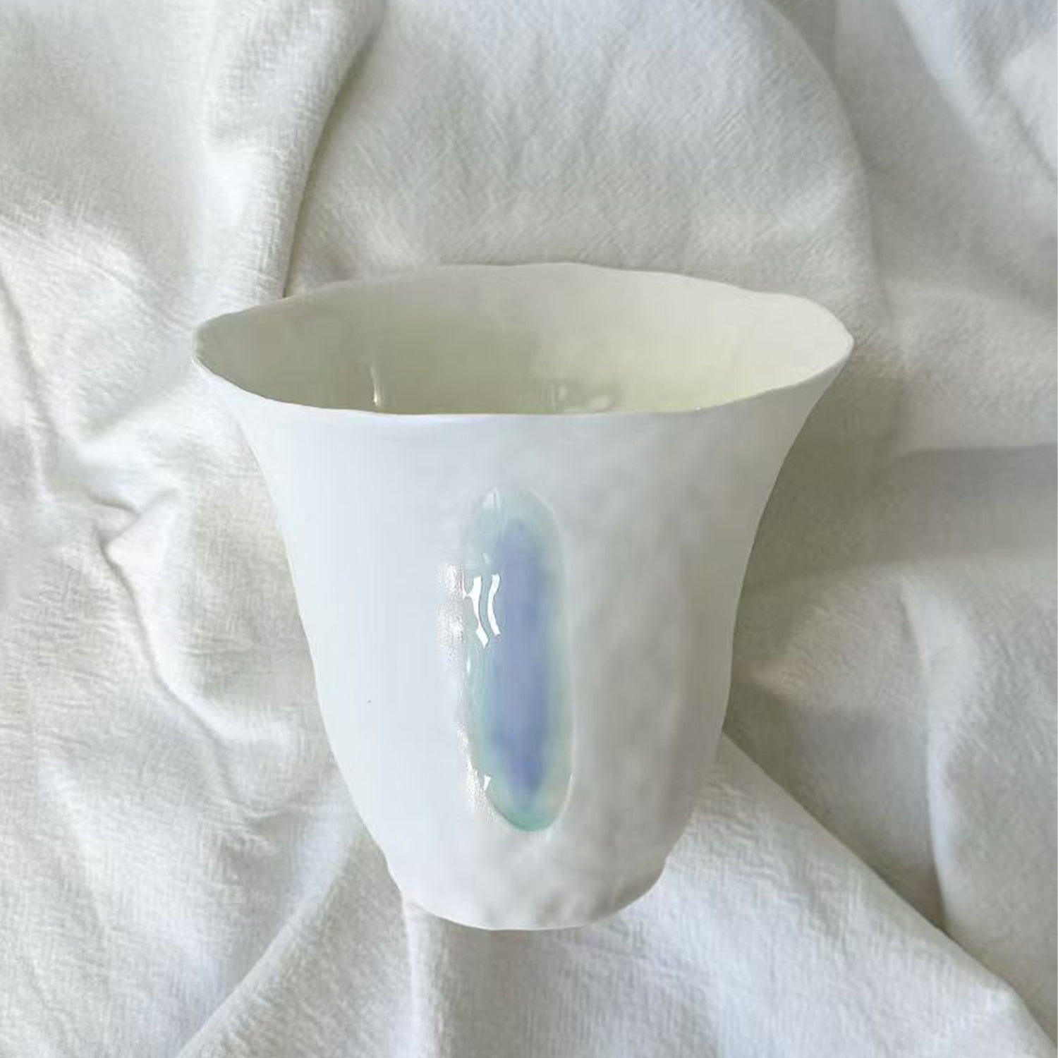 Jiayu · Flowing Eternity · Hand-Pinched White Porcelain Cup