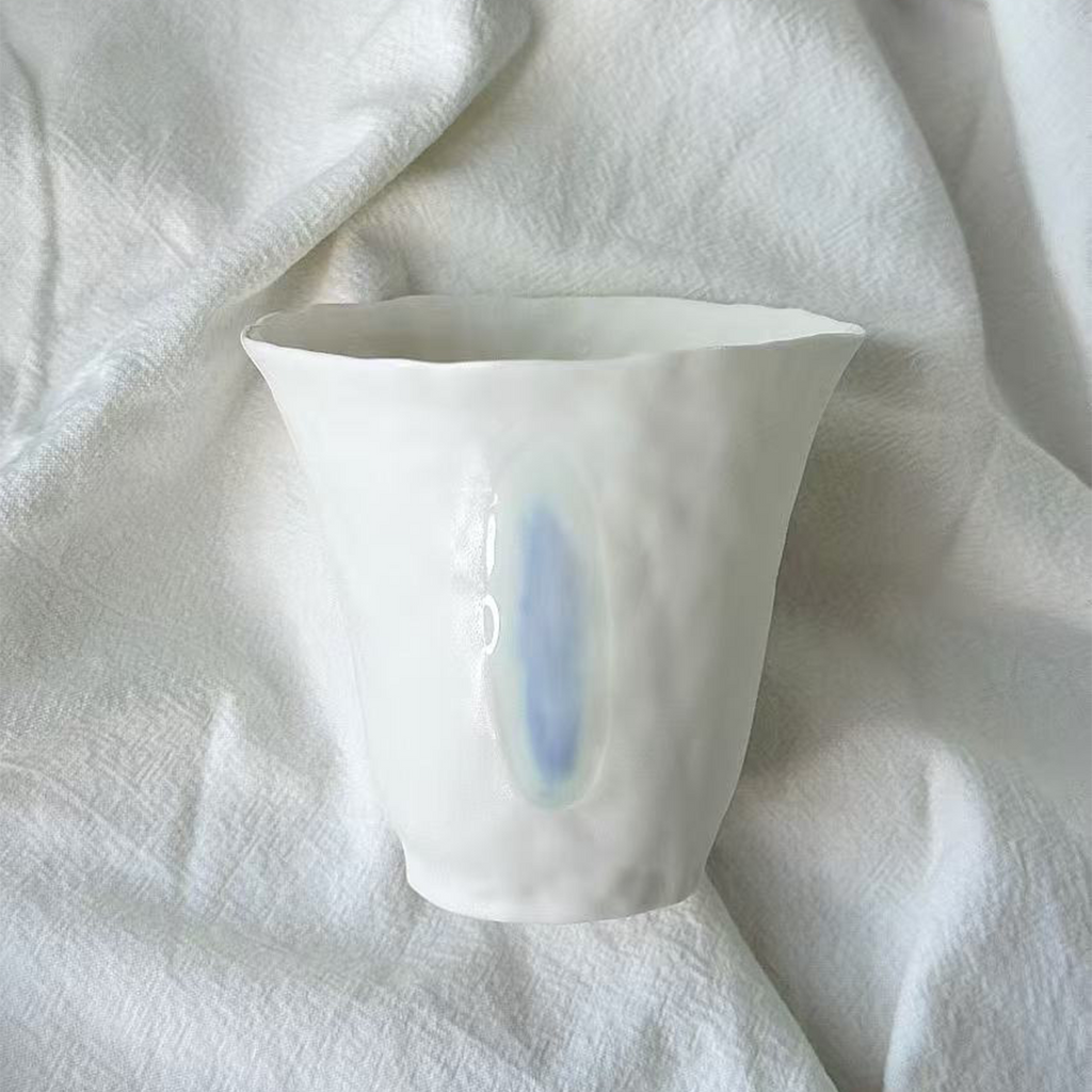 Jiayu · Flowing Eternity · Hand-Pinched White Porcelain Cup
