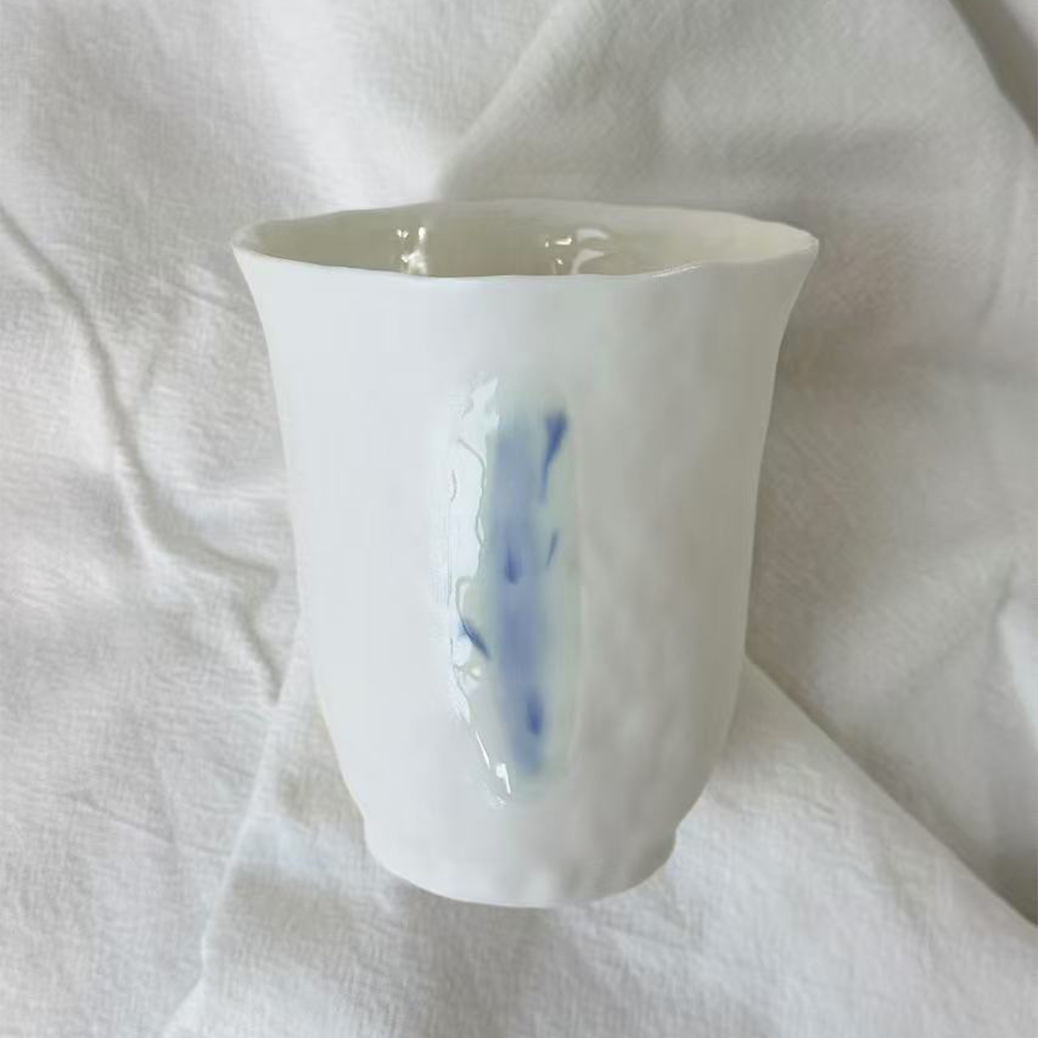 Jiayu · Flowing Eternity · Hand-Pinched White Porcelain Cup