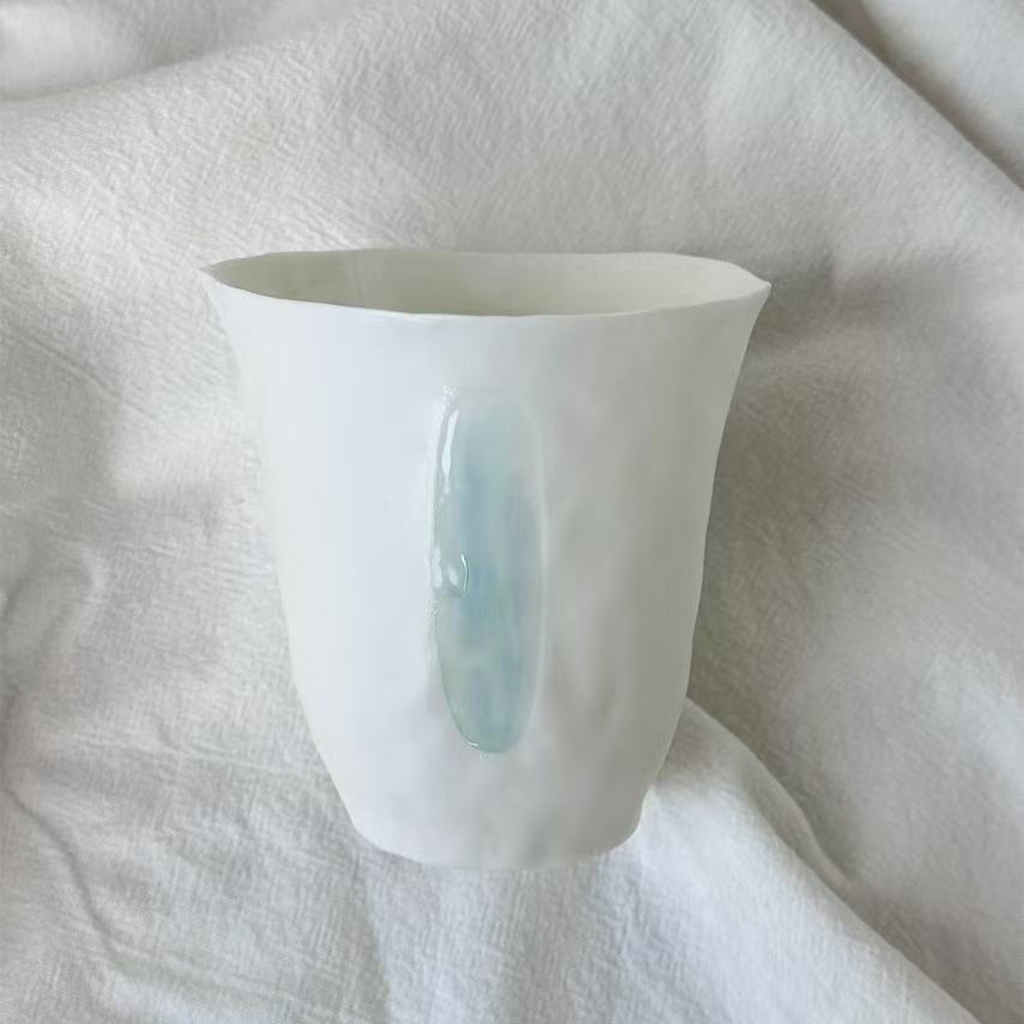 Jiayu · Flowing Eternity · Hand-Pinched White Porcelain Cup