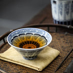 Hand-Painted Scrollwork Tea Cup
