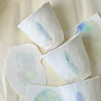 Jiayu · Flowing Eternity · Hand-Pinched White Porcelain Cup