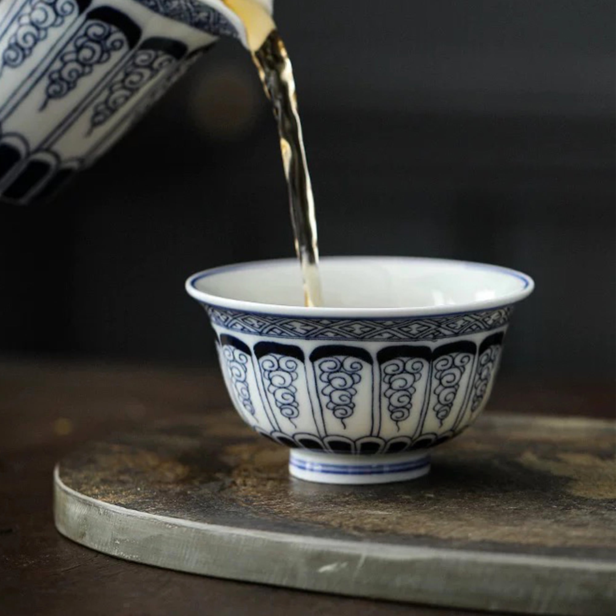 Hand-Painted Scrollwork Tea Cup